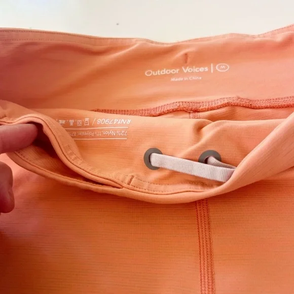 Outdoor Voices Tech Sweat Biker Shorts in Heathered Orange Peach - Picture 5 of 16